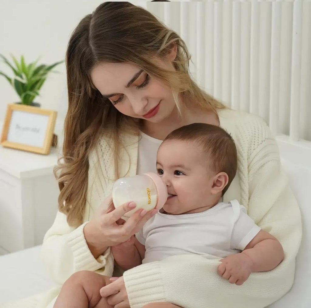 Oberni Baby Bottles with Slow Off-Centered Nipple for 0+ Months, Anti Colic Newborn Milk Feeding Bottle, 150ml/5oz/Pink/3Pack