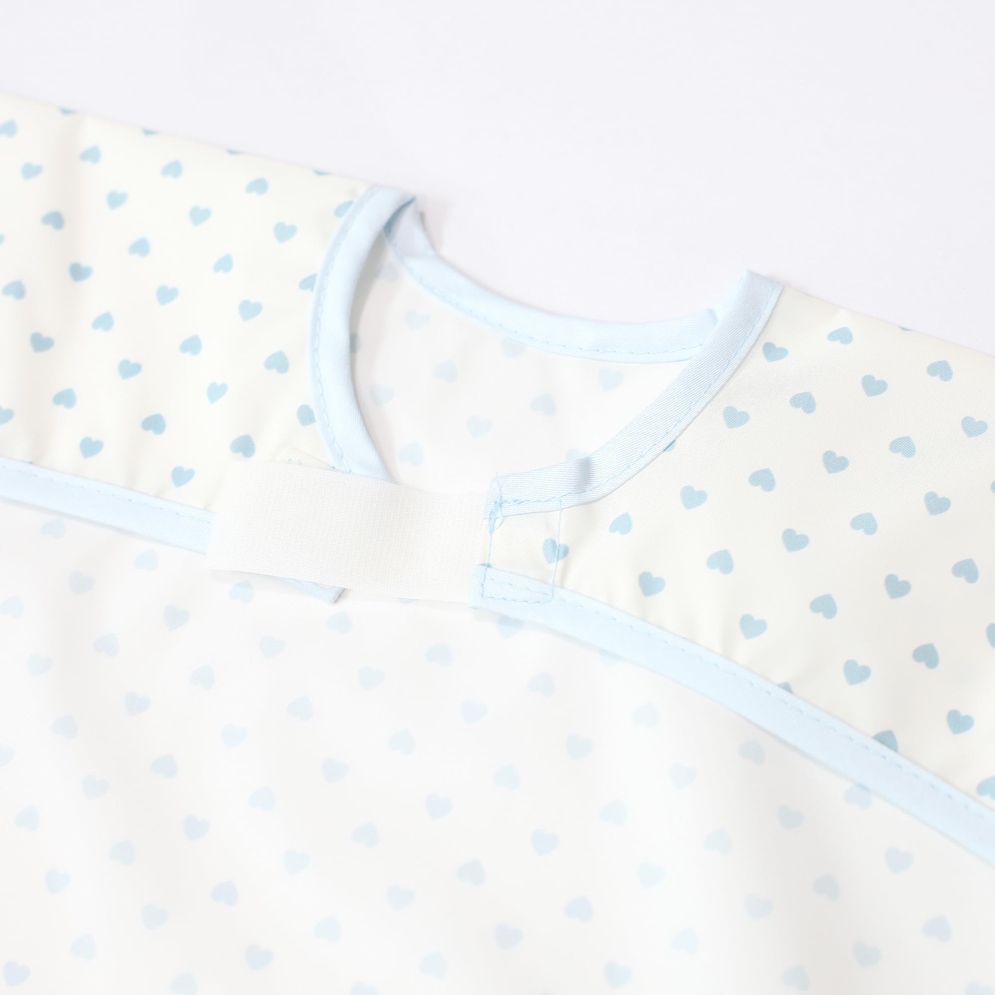 Plie Short Sleeve Waterproof Bib for Toddlers – Easy Clean Feeding Apron for Mealtime, Daycare, Self-Feeding & Messy Play, Lightweight BPA-Free Baby Bib (6–24 Months) - Blue Heart