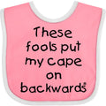 inktastic These Fools Put My Cape on Backwards Baby Bib Pink and White 10a80