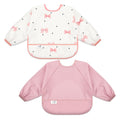 BebeBiu Long Sleeve Baby Bib, Waterproof Fabric, Full Coverage with Catch-All Pocket, Baby Smock Bib, Adjustable Sleeves Toddler bib for Ages 6-24 Months (Bows Blush, Small 6-24 Months)