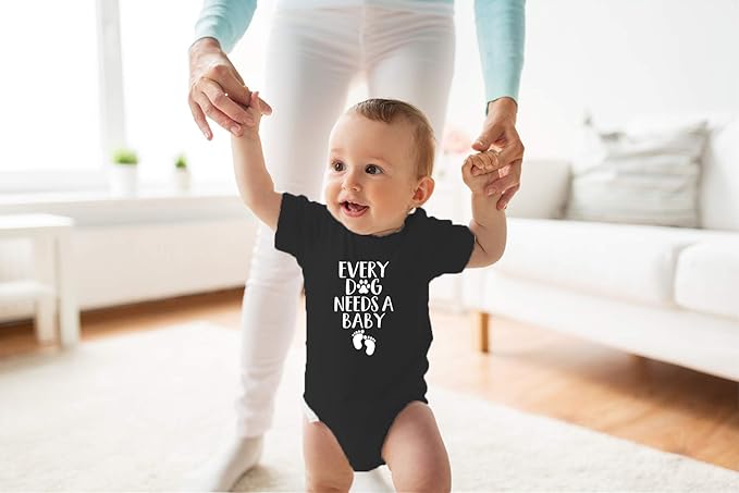 Every Dog Needs a Baby - Funny Baby Essentials Bodysuit - Baby Boy Clothes Newborn Girl Outfits