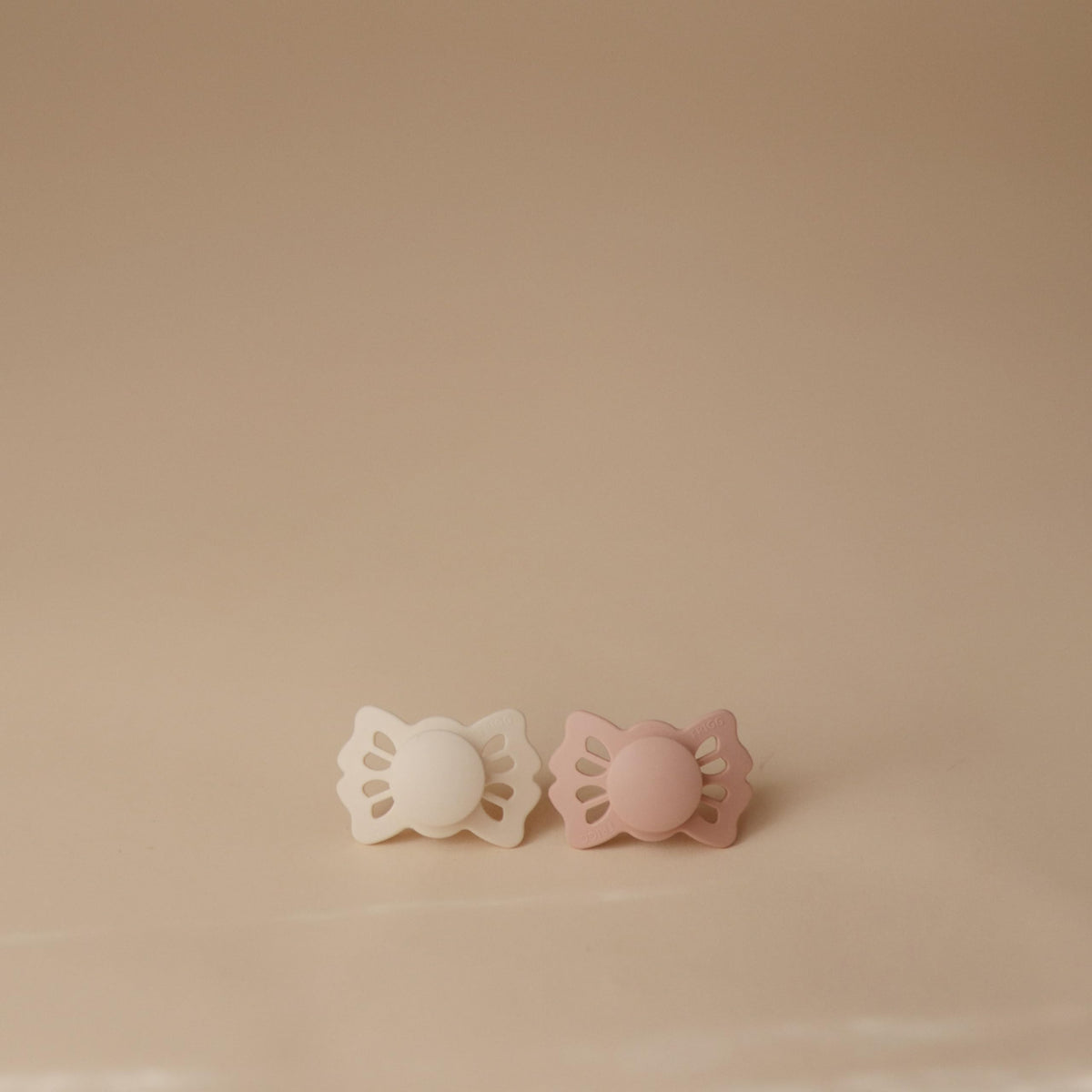 FRIGG Lucky Symmetrical SilkySoft Silicone Baby Pacifier | Made in Denmark | BPA-Free (Cream/Blush, 0-6 Months)