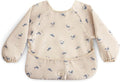 mushie Long Sleeve Baby Bib | Water Resistant Adjustable Fit for Ages 6-24 Months