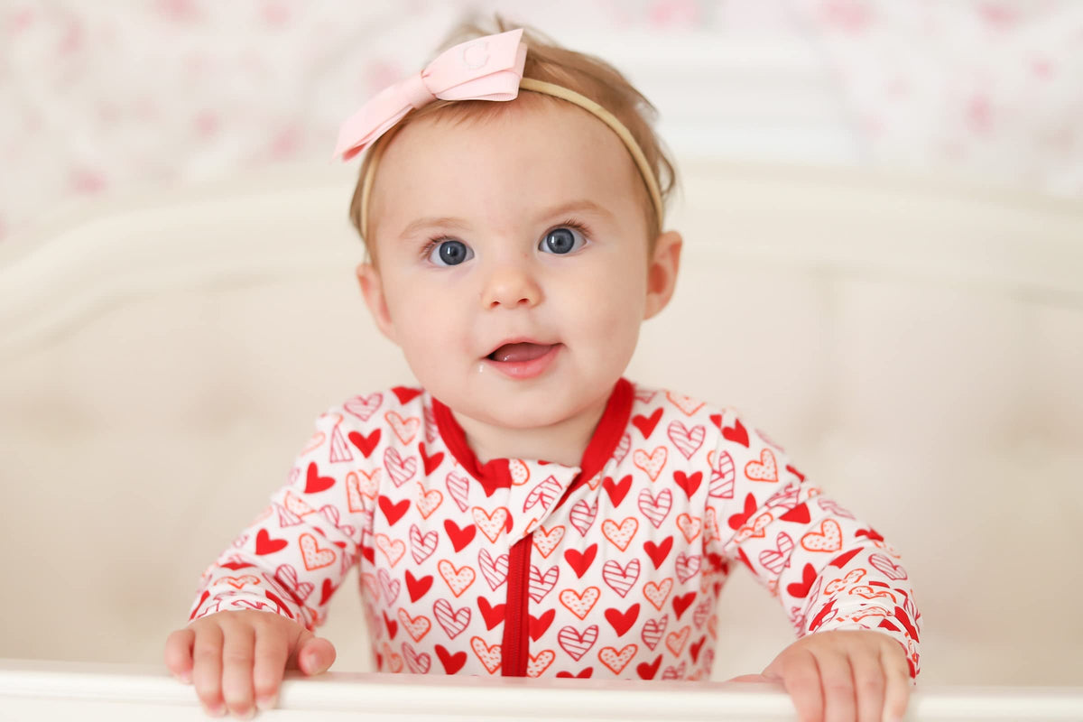 KicKee Full of Hearts Footie with Zipper, One-Piece Boy or Girl Baby Clothes (Natural Hearts - Newborn)