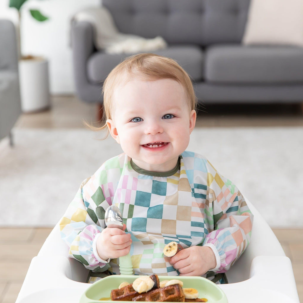 Bumkins Sleeved Bib for Girl or Boy, Baby and Toddler for 6-24 Mos, Essential Must Have for Eating, Feeding, Baby Led Weaning Supplies, Long Sleeve Mess Saving Food Catcher, Soft Fabric, Multi Check