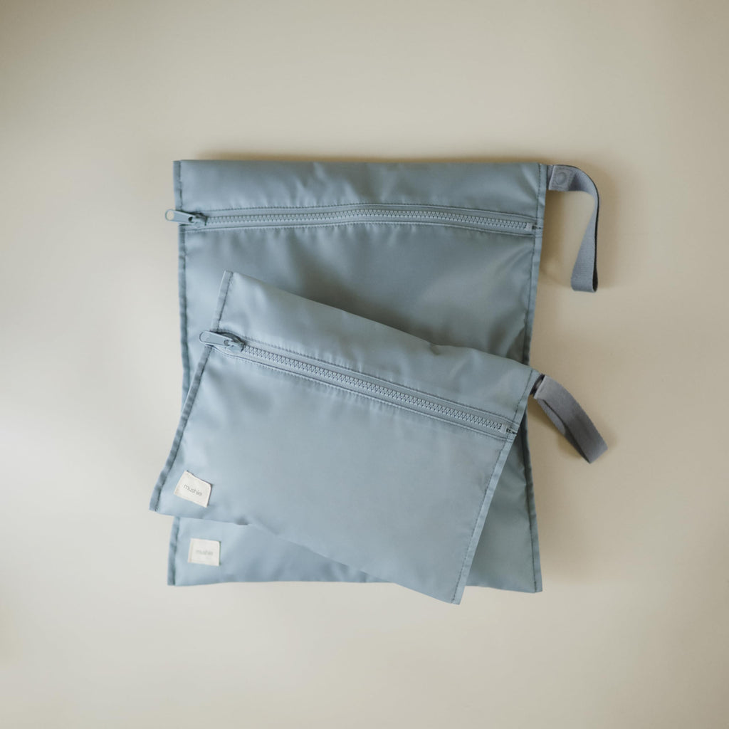 mushie Water Resistant Wet Bags | Large & Small Reusable Storage Bag for Baby Items and Travel | Zippered Pockets with Handle | Machine Washable, Set of 2 (Tradewinds)