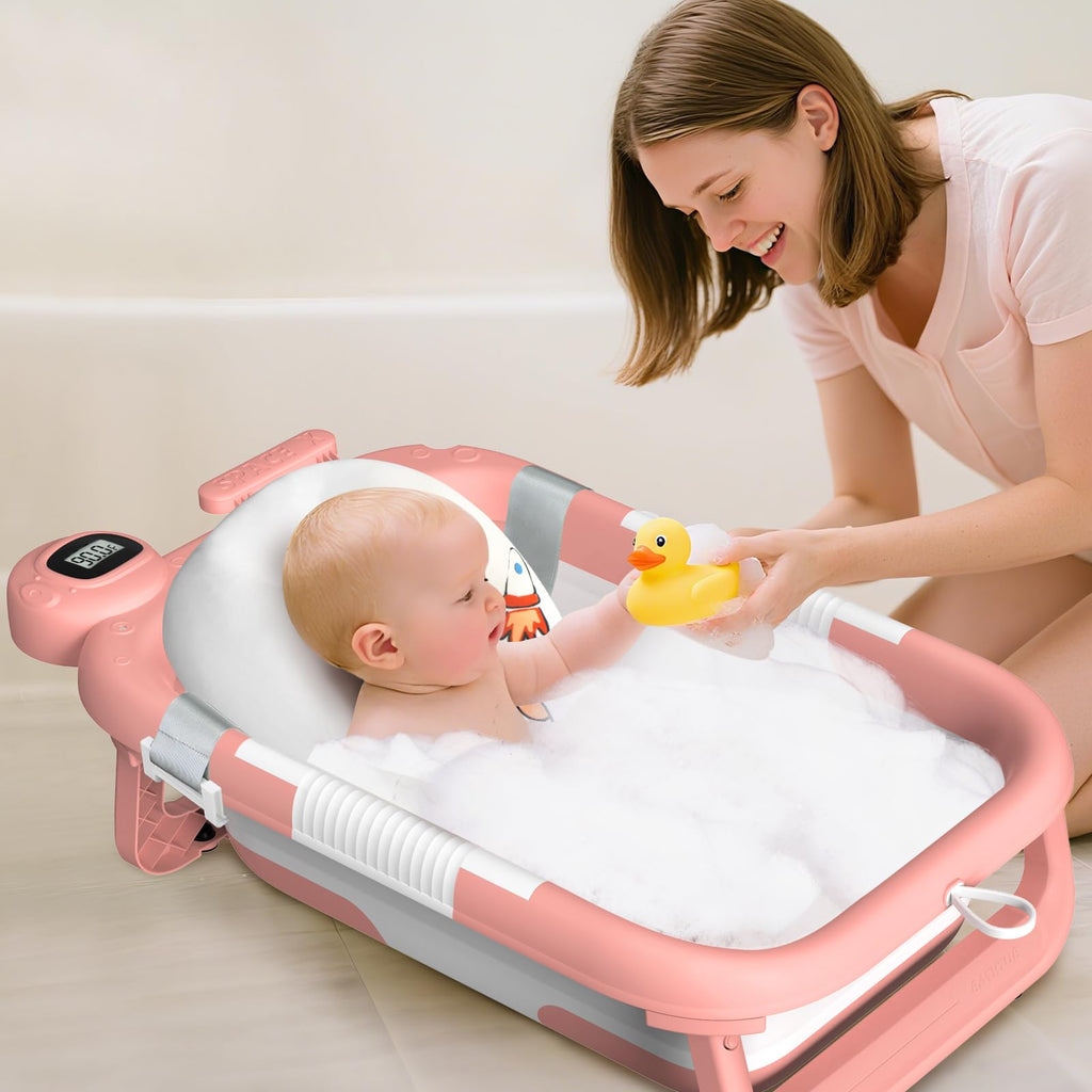 Collapsible Baby Bathtub for Newborn to Toddler (0-24 Months), Portable Baby Bath Tub for Travel, Newborn Bathtub with Soft and Supportive Cushion (Astronaut-Pink)