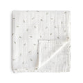 mushie Muslin Baby Swaddle Blanket | 100% Organic Cotton (Leaves)