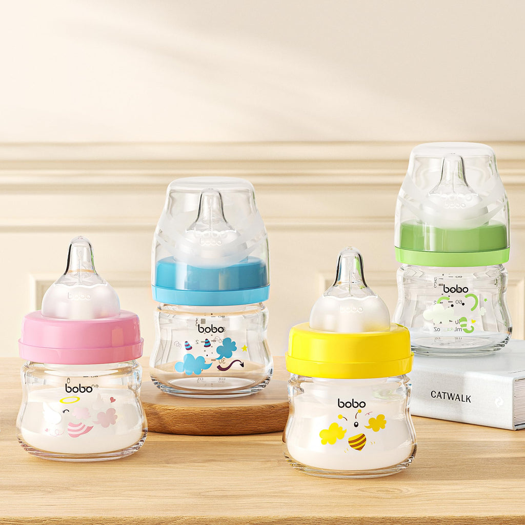 YOHKOH Glass Baby Bottles with Slow Flow Nipple, Newborn Anti-Colic Baby Bottles for 0+ Months, Wide Neck Feeding Bottle, Clear (Multicolour, 2.7oz (Pack of 2))