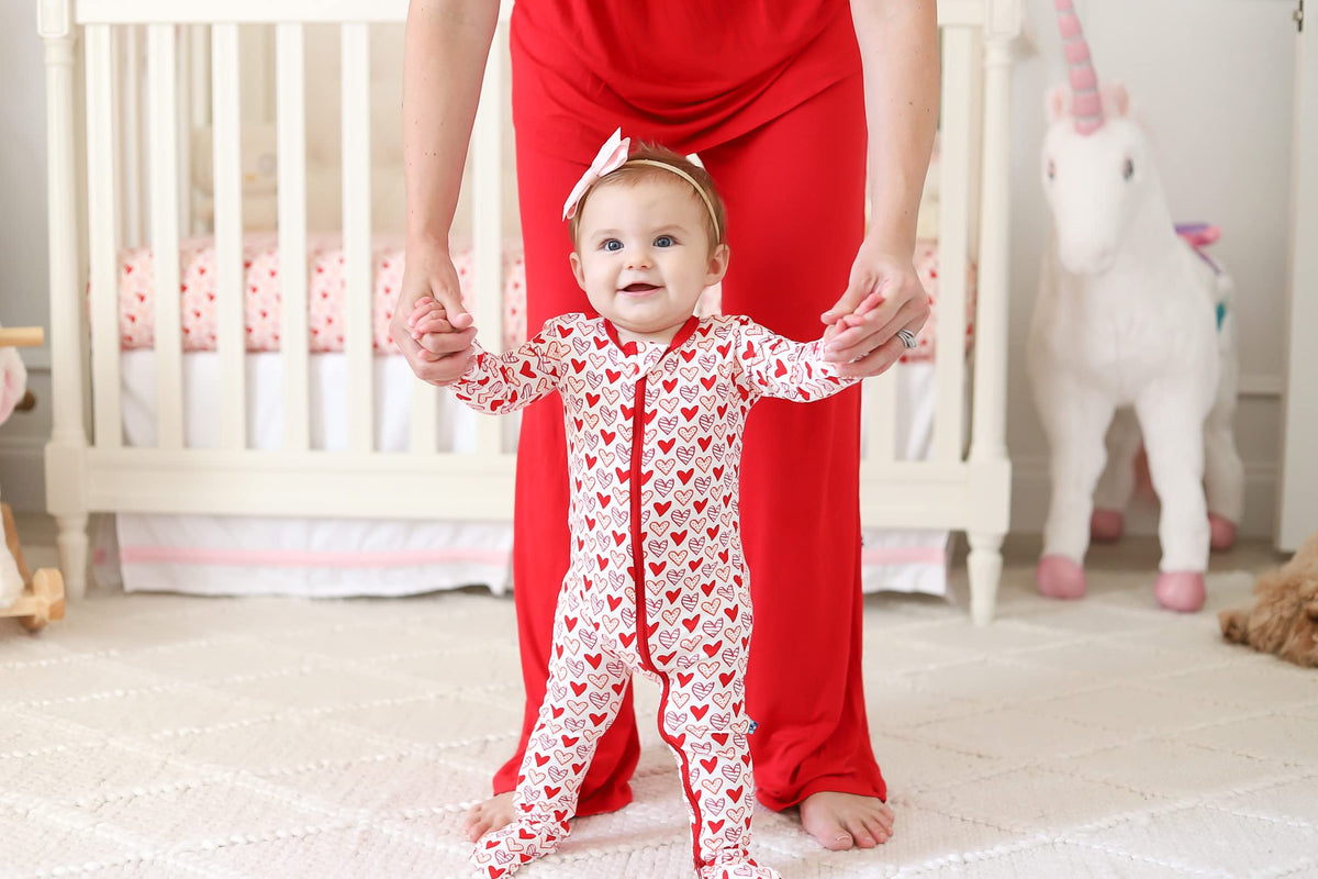 KicKee Full of Hearts Footie with Zipper, One-Piece Boy or Girl Baby Clothes (Natural Hearts - Newborn)