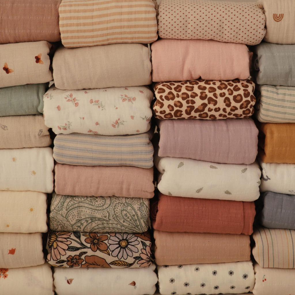 mushie Muslin Baby Swaddle Blanket | 100% Organic Cotton (Happy Flowers Check)