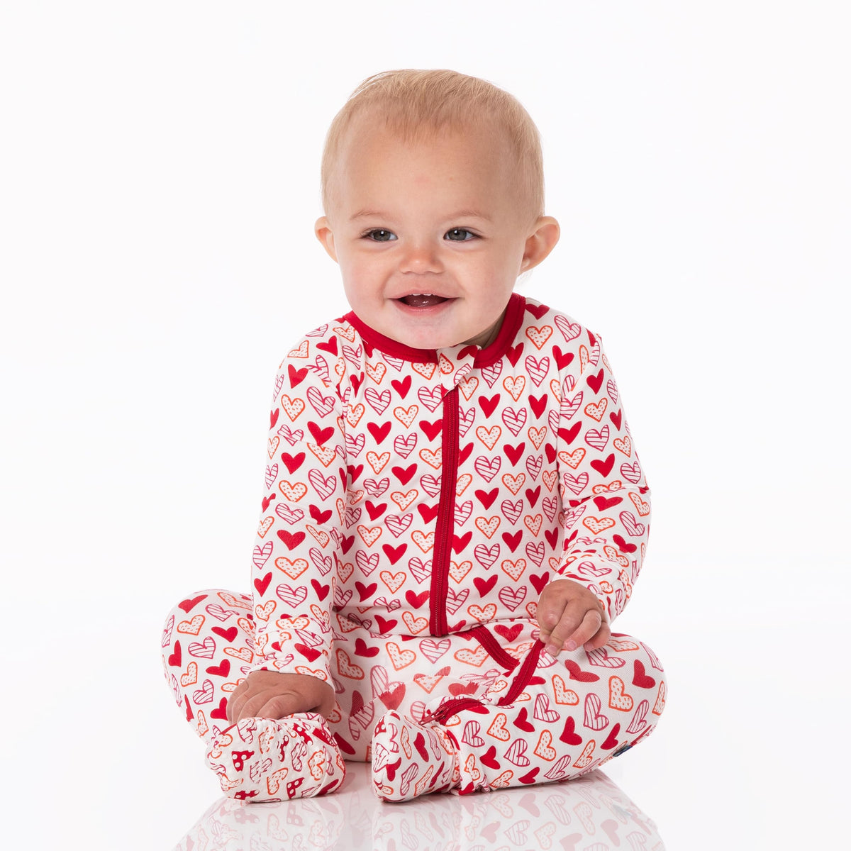 KicKee Full of Hearts Footie with Zipper, One-Piece Boy or Girl Baby Clothes (Natural Hearts - Newborn)