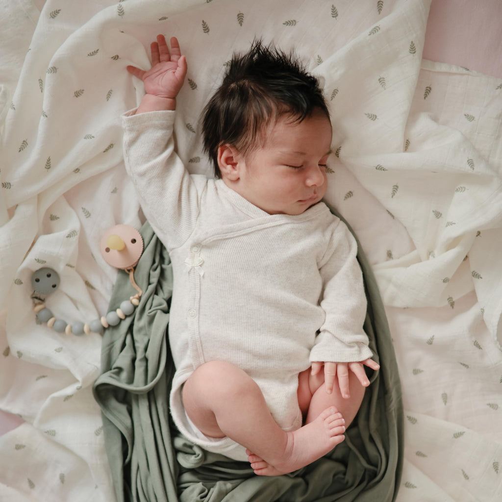 mushie Muslin Baby Swaddle Blanket | 100% Organic Cotton (Leaves)