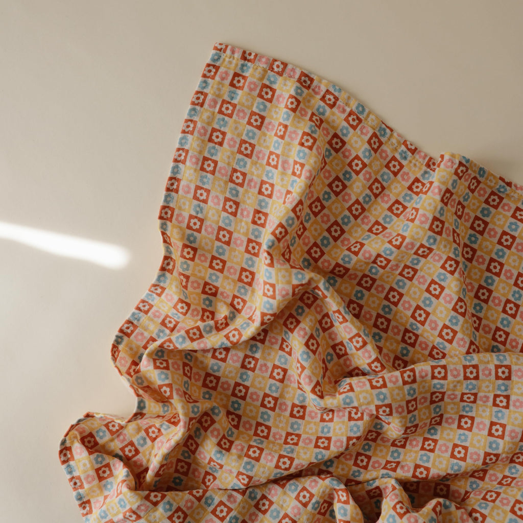mushie Muslin Baby Swaddle Blanket | 100% Organic Cotton (Happy Flowers Check)